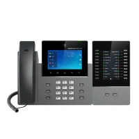 Grandstream GXV3450 IP Video Phone shown with attached extension module for expanded functionality in Pakista